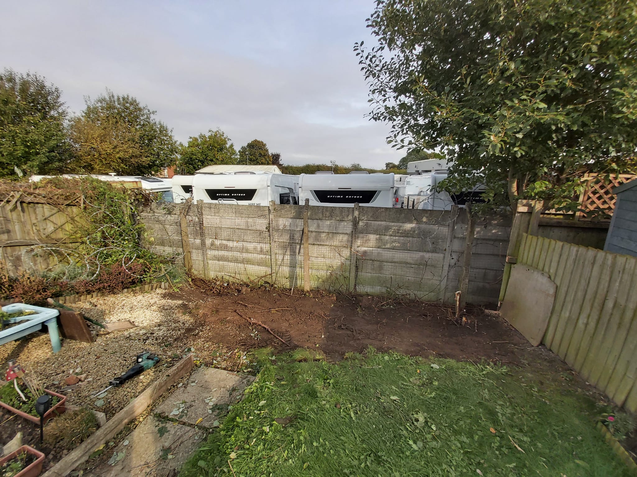 Fencing nearing completion along a residential boundary